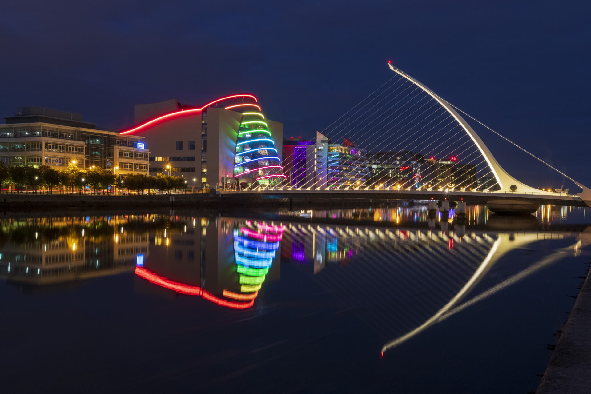 Docklands, Dublin, Convention Centre and Samuel Beckett Bridge refected in the River Liffey