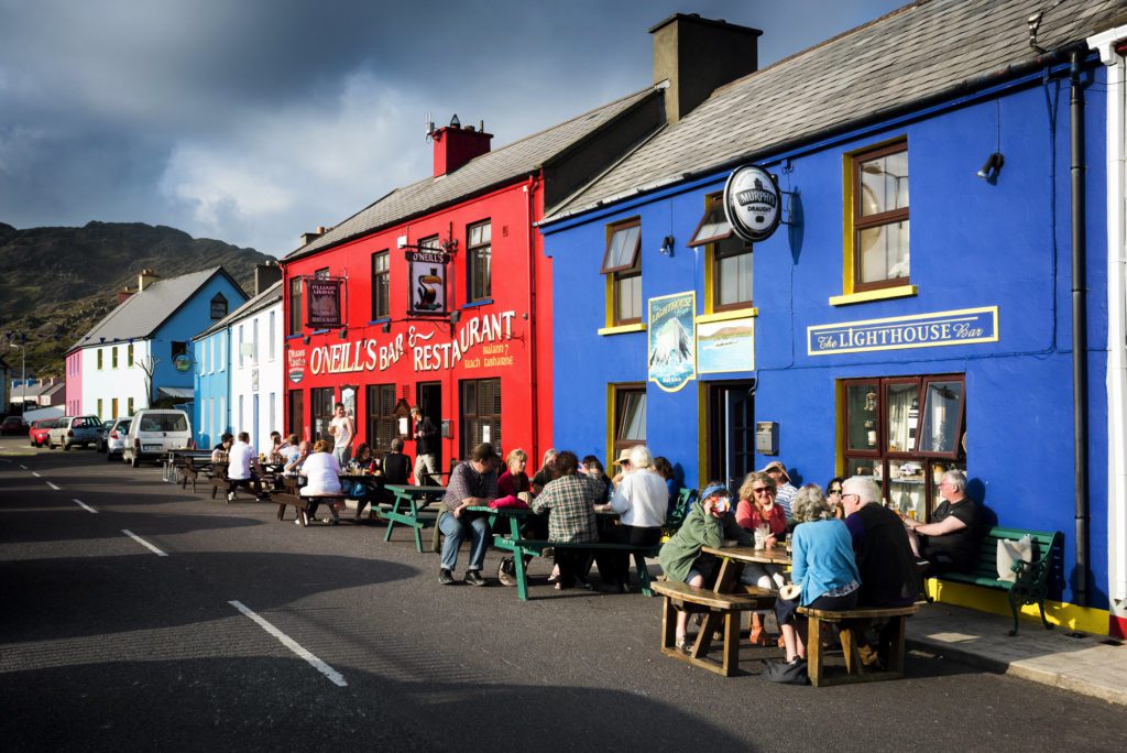 Tourists having food at the outdoor restaurants