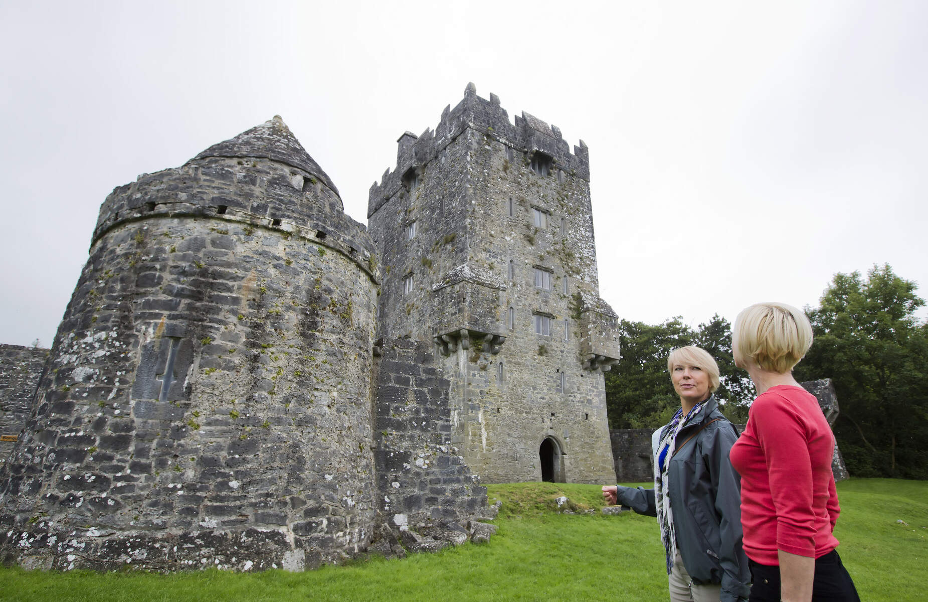 people Looking at the Aughnanure Castle