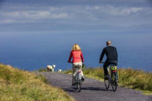 Couple cycling around the Valentia island