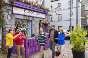 People standing at the Irish Tea shop